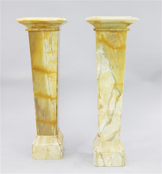 A pair of 20th century marble pillars, H.4ft 1.5in.